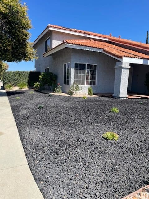 Eco-Friendly Yard Transformation with Lava Rock image
